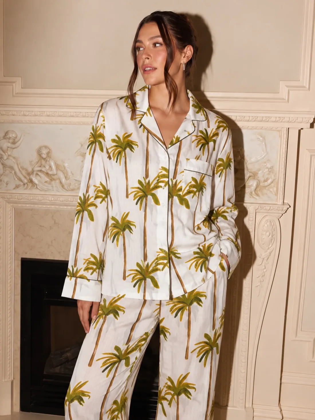 A woman in the White Palm pajama set